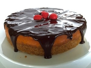 A side view of Chocolate-Covered Raspberry Cheesecake