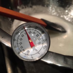 Instant Read Thermometer submerged in the meringue mix - a preparation step in order to make White Chocolate Buttercream