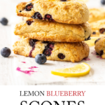 A photo of 3 lemon blueberry scones stacked atop each other, prepared for Pinterest pinning.