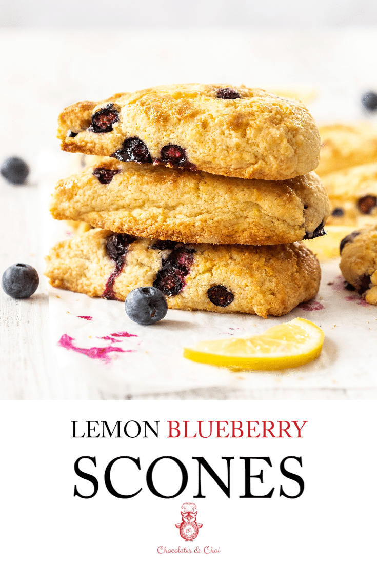 A photo of 3 lemon blueberry scones stacked atop each other, prepared for Pinterest pinning.