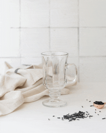A gif showing the steps to creating the malted mocha dalgona coffee in an Irish mug.