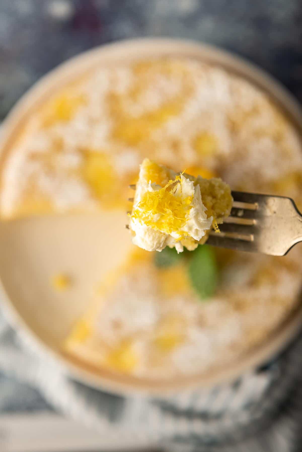 A close up of a bite of the Italian cheesecake with a bit of mascarpone on a fork.