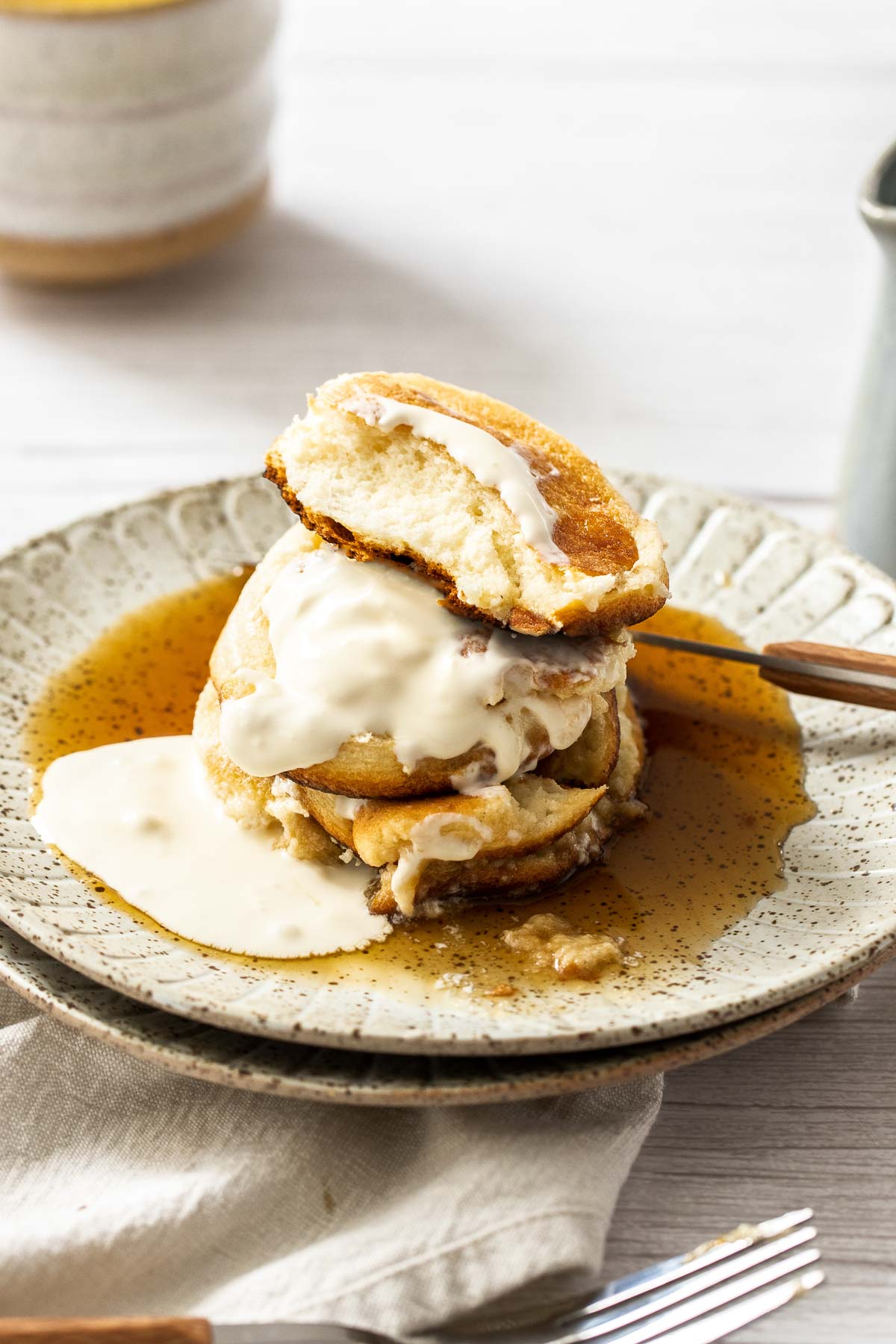 Japanese souffle pancakes cut open to show the airy interior.