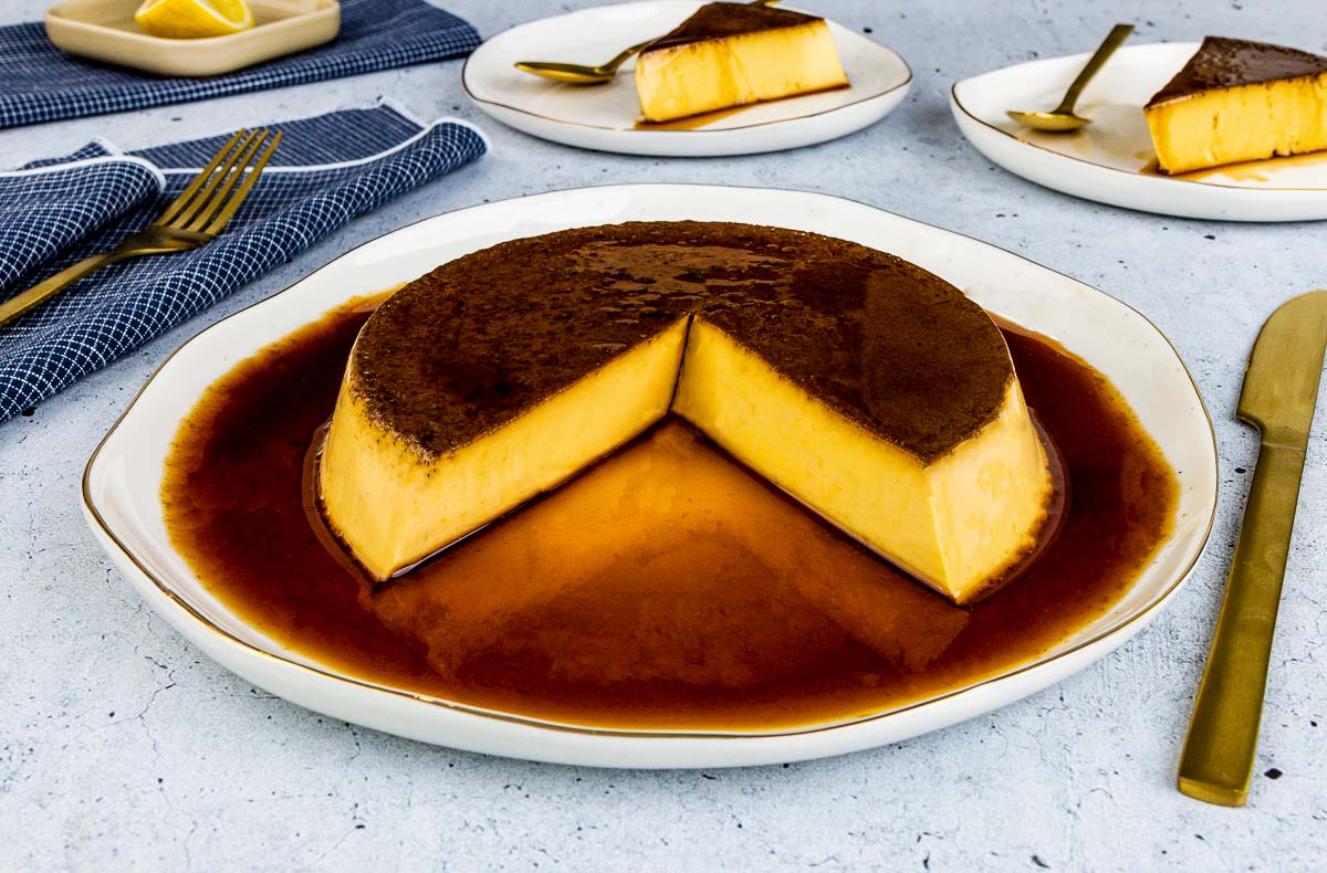 A close-up view of the interior of a creme caramel pudding that has been cut into.