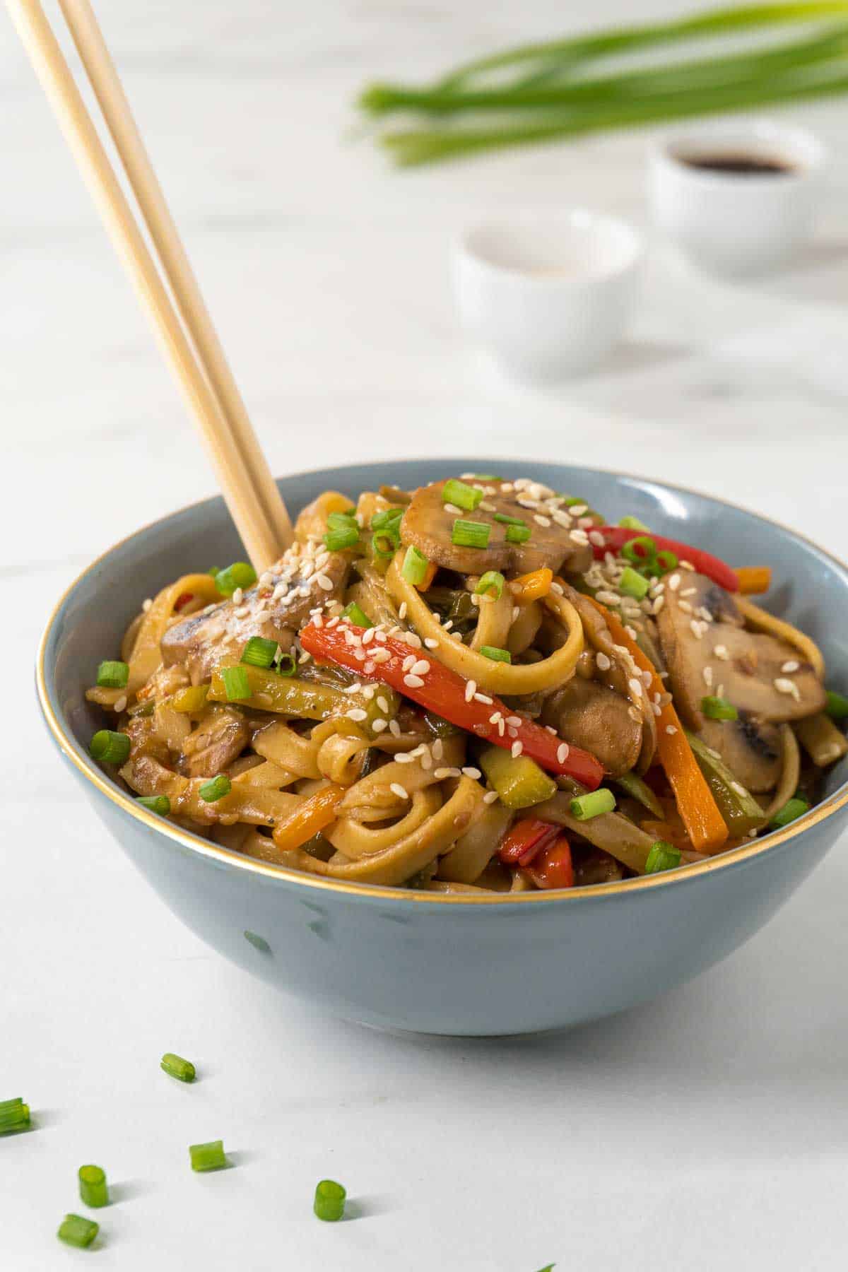 A bowl filled with an Asian-inspired vegetable pasta.